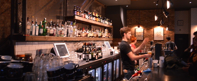 Vibrant bar at The Elgin, ideal for networking events and social gatherings.