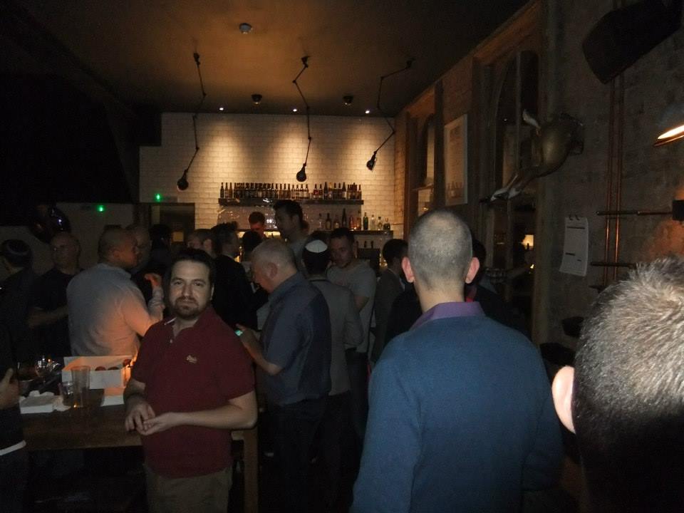 Lively networking event at Top Bar in The Elgin, featuring engaged attendees and a relaxed atmosphere.