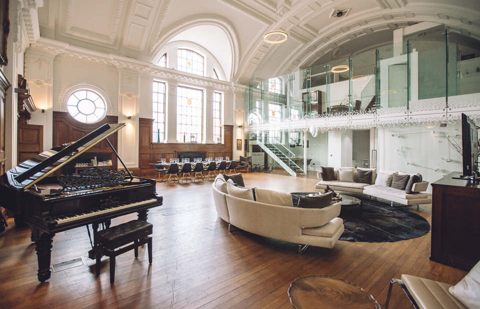 De Montfort Suite at Town Hall Hotel, featuring a grand piano for corporate events.