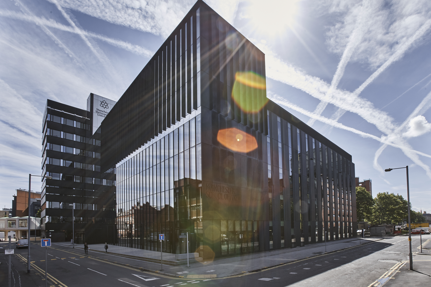 Modern Benzie Building meeting space with glass facade, ideal for corporate events and conferences.