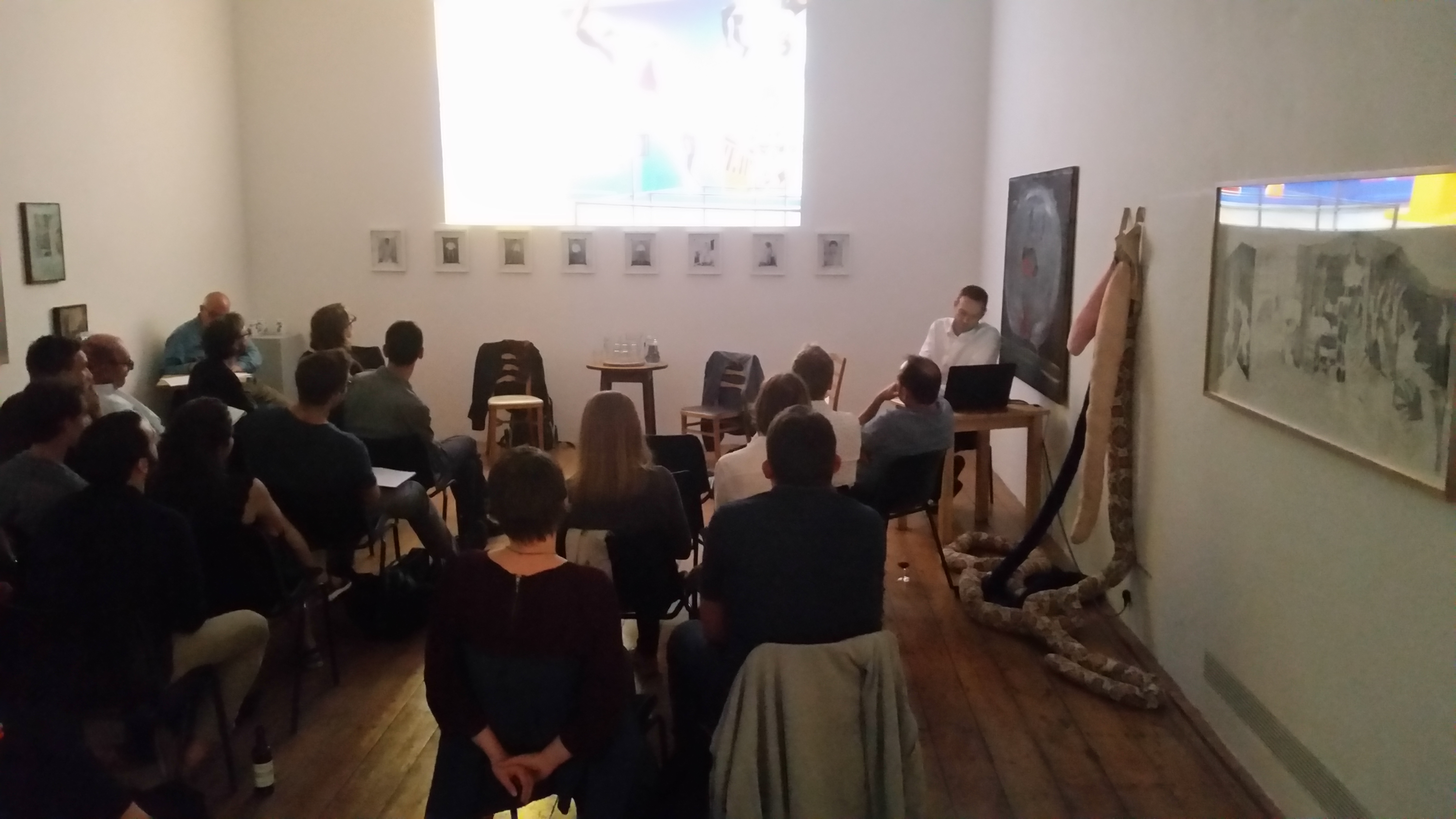 Nunnery Gallery workshop with engaged audience and artistic decor for creative events.