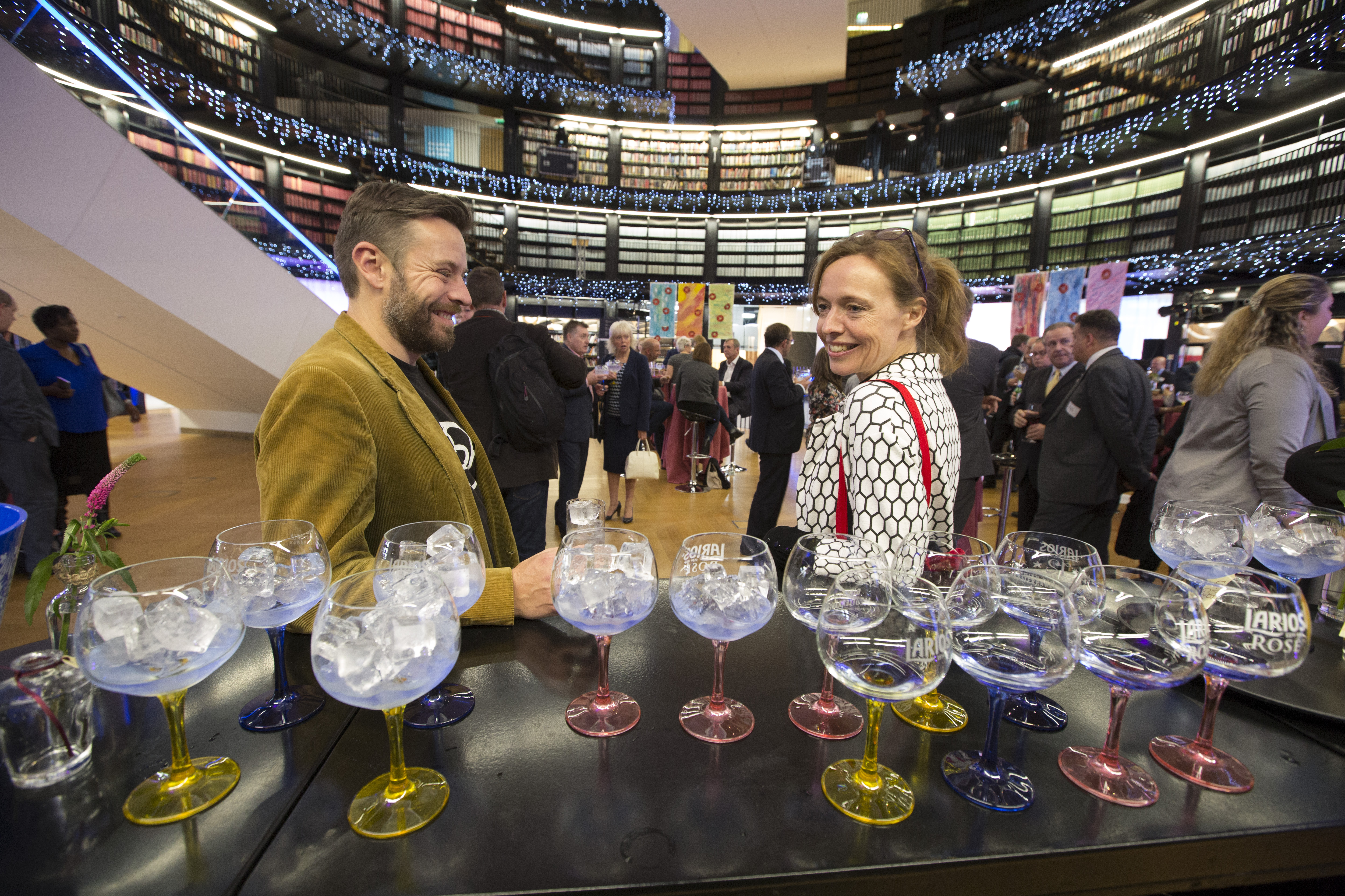 Vibrant networking event in Book Rotunda, Birmingham with elegant drinks and festive lighting.