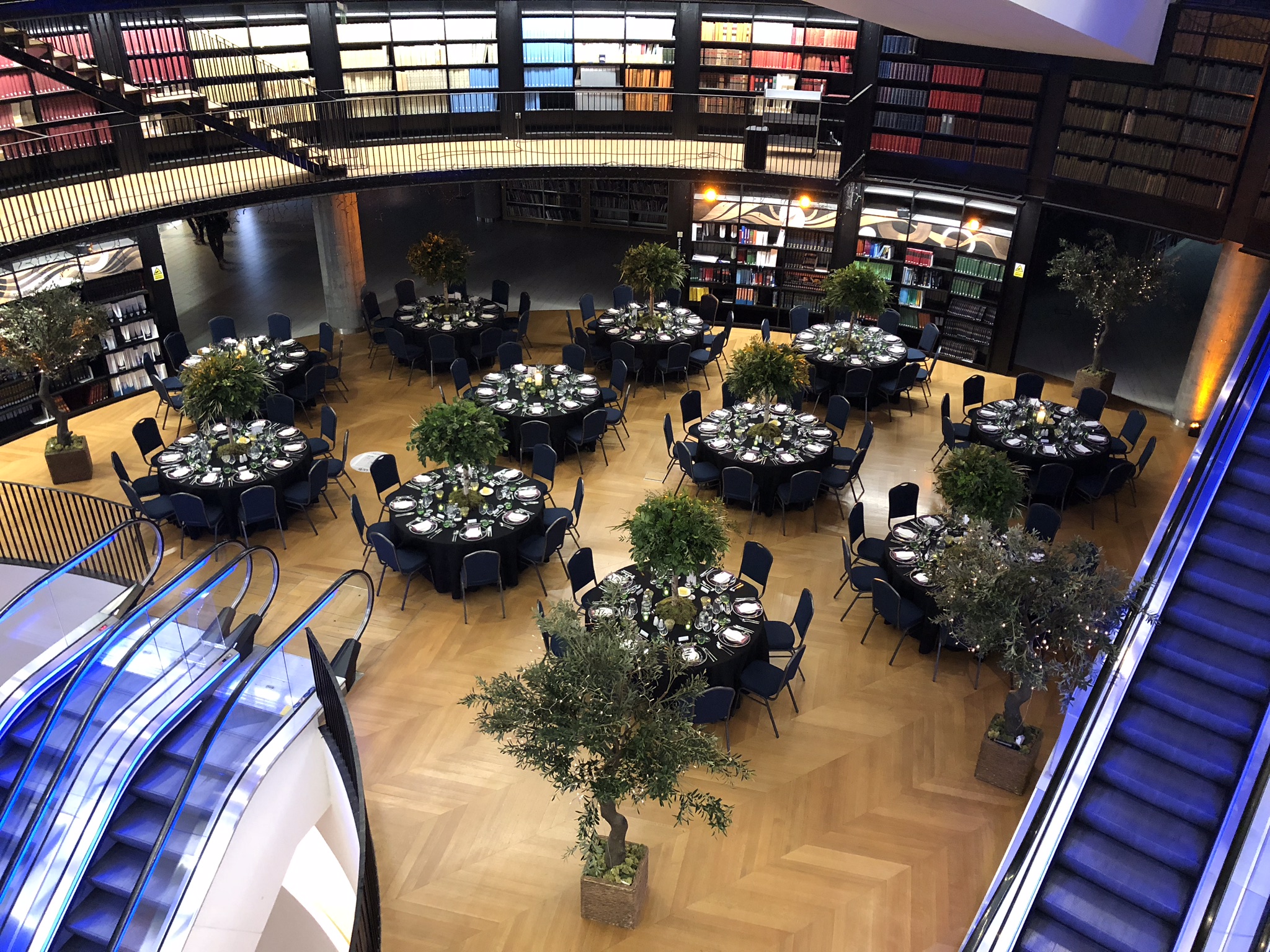 Book Rotunda event space with round tables, ideal for corporate gatherings and celebrations.
