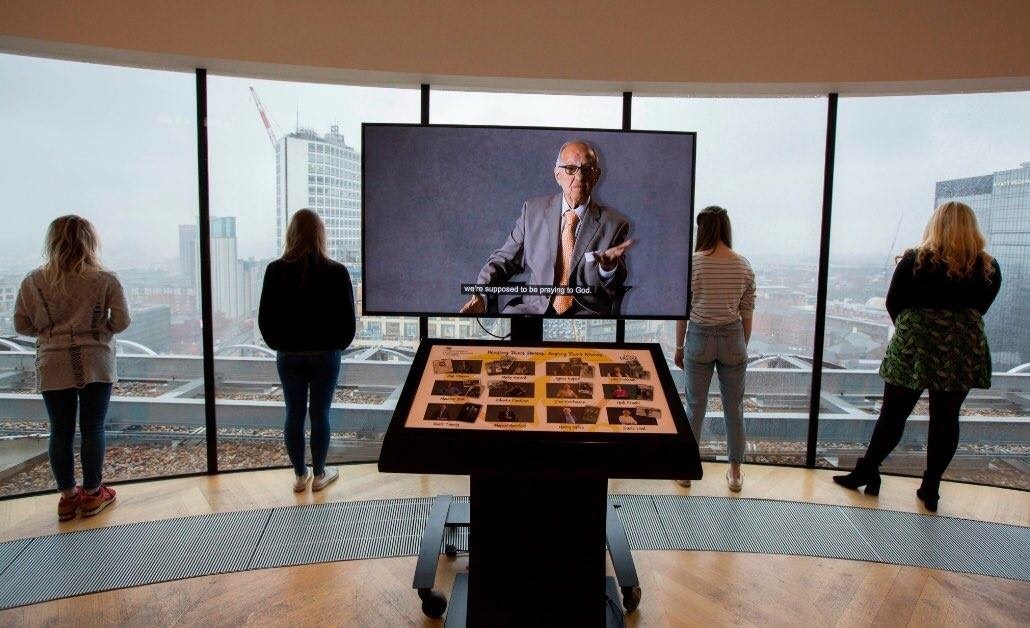 Shakespeare Memorial Room with large screen, ideal for networking and educational events.