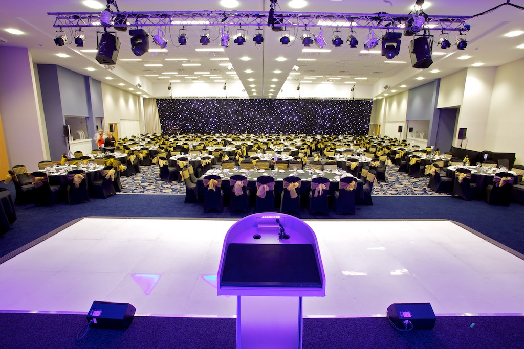 Banqueting Suite at Edgbaston Stadium, elegant black and gold decor for corporate events.