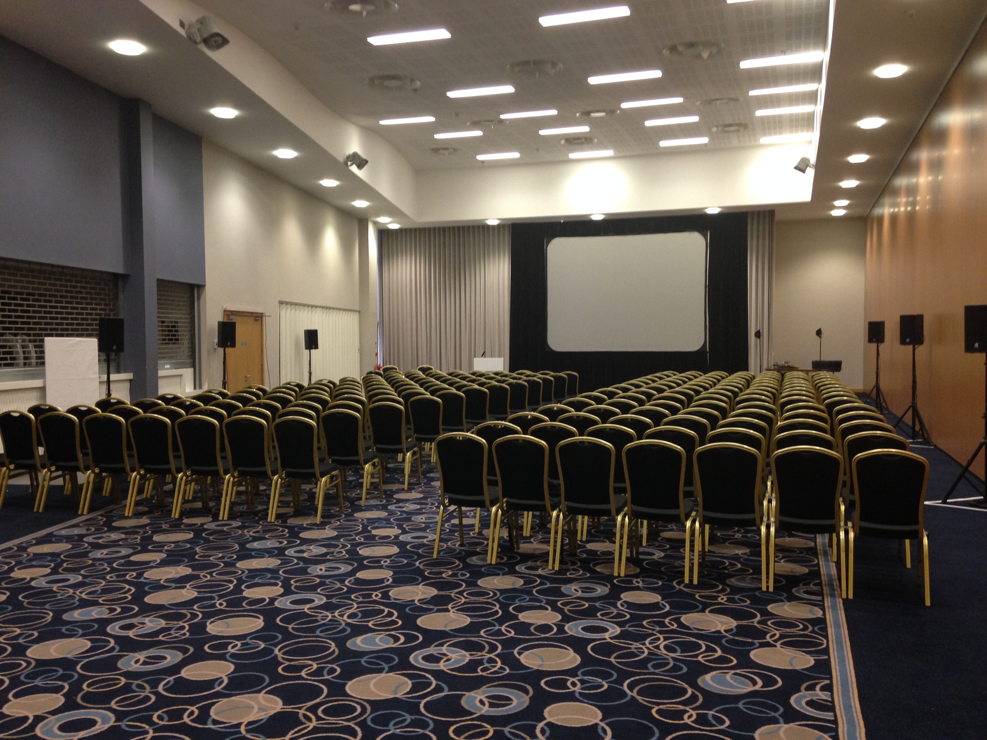 Banqueting Suite at Edgbaston Stadium, ready for a conference with arranged seating.