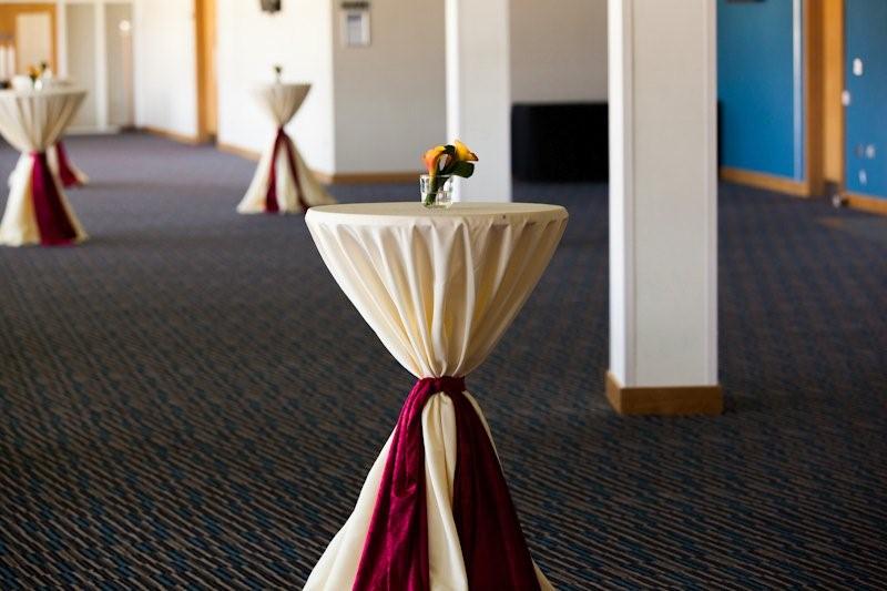 Spacious Edgbaston Stadium event venue with cocktail tables for networking gatherings.