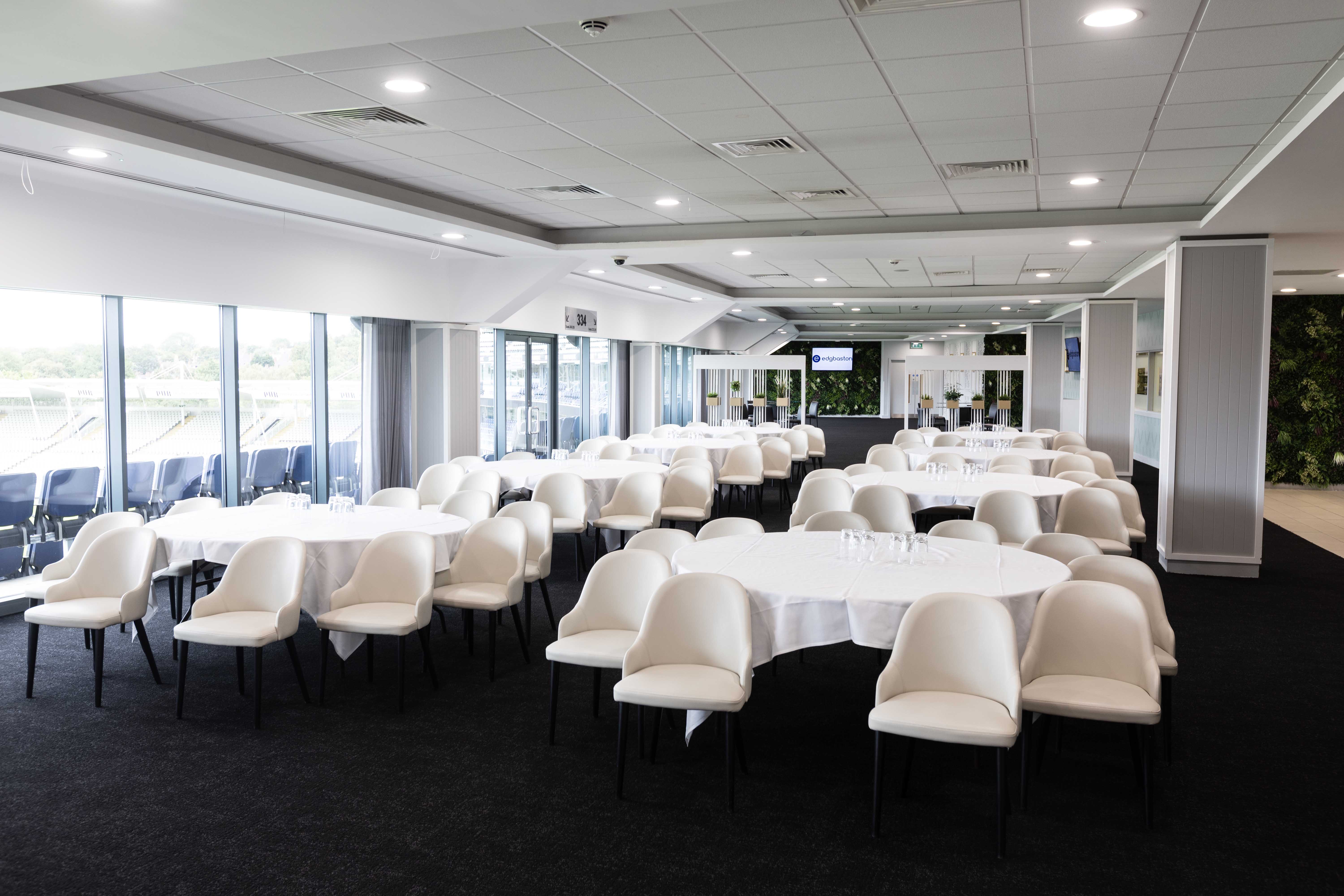 Warwickshire Suite at Edgbaston Stadium, bright event space for corporate dinners and networking.