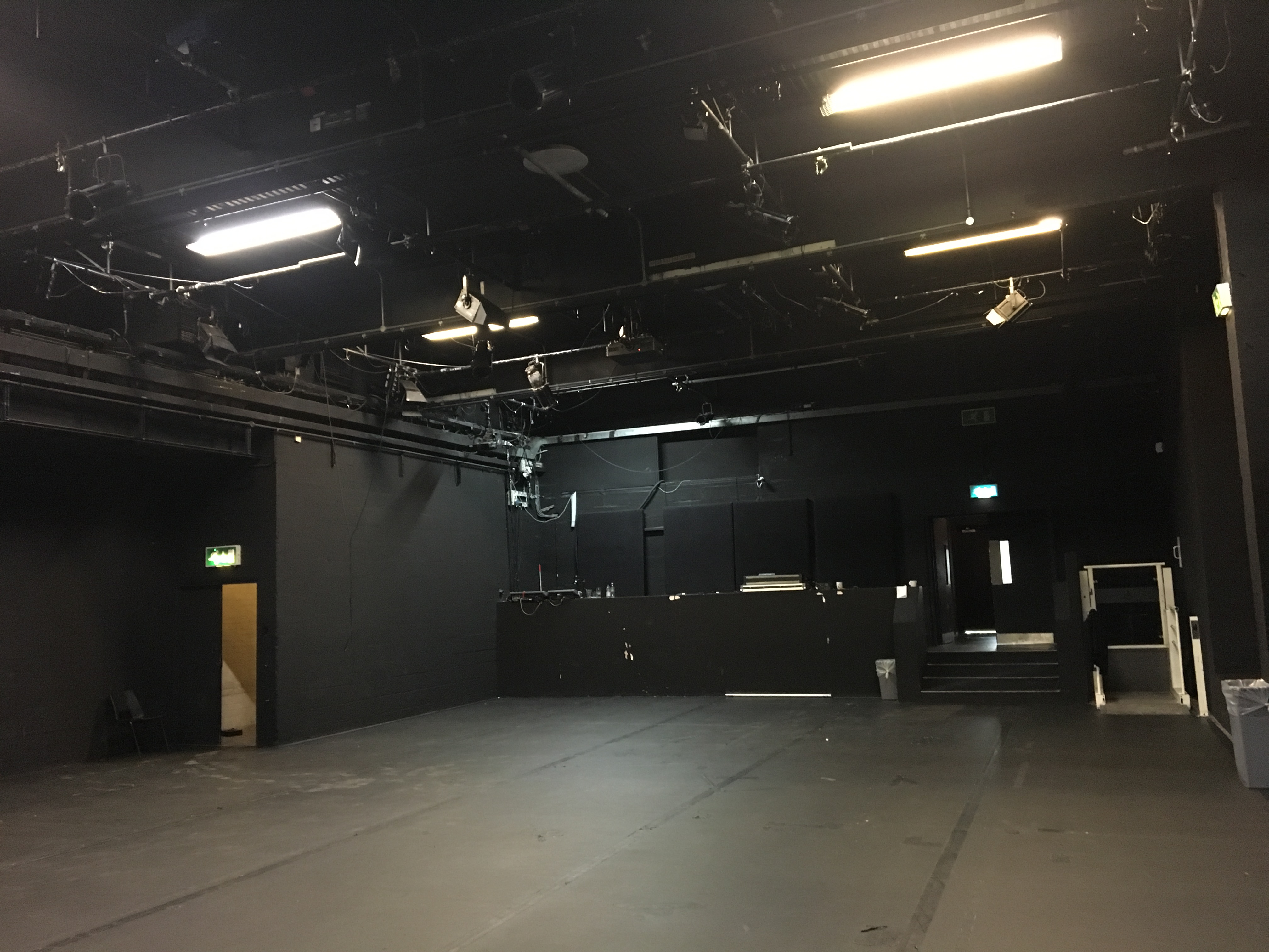 Versatile black box theater at ICA, perfect for corporate events and artistic performances.