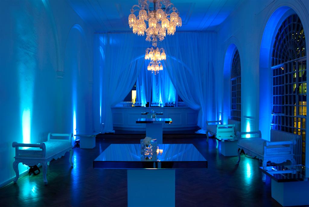 Elegant event space at One Marylebone with blue lighting and modern decor for upscale gatherings.