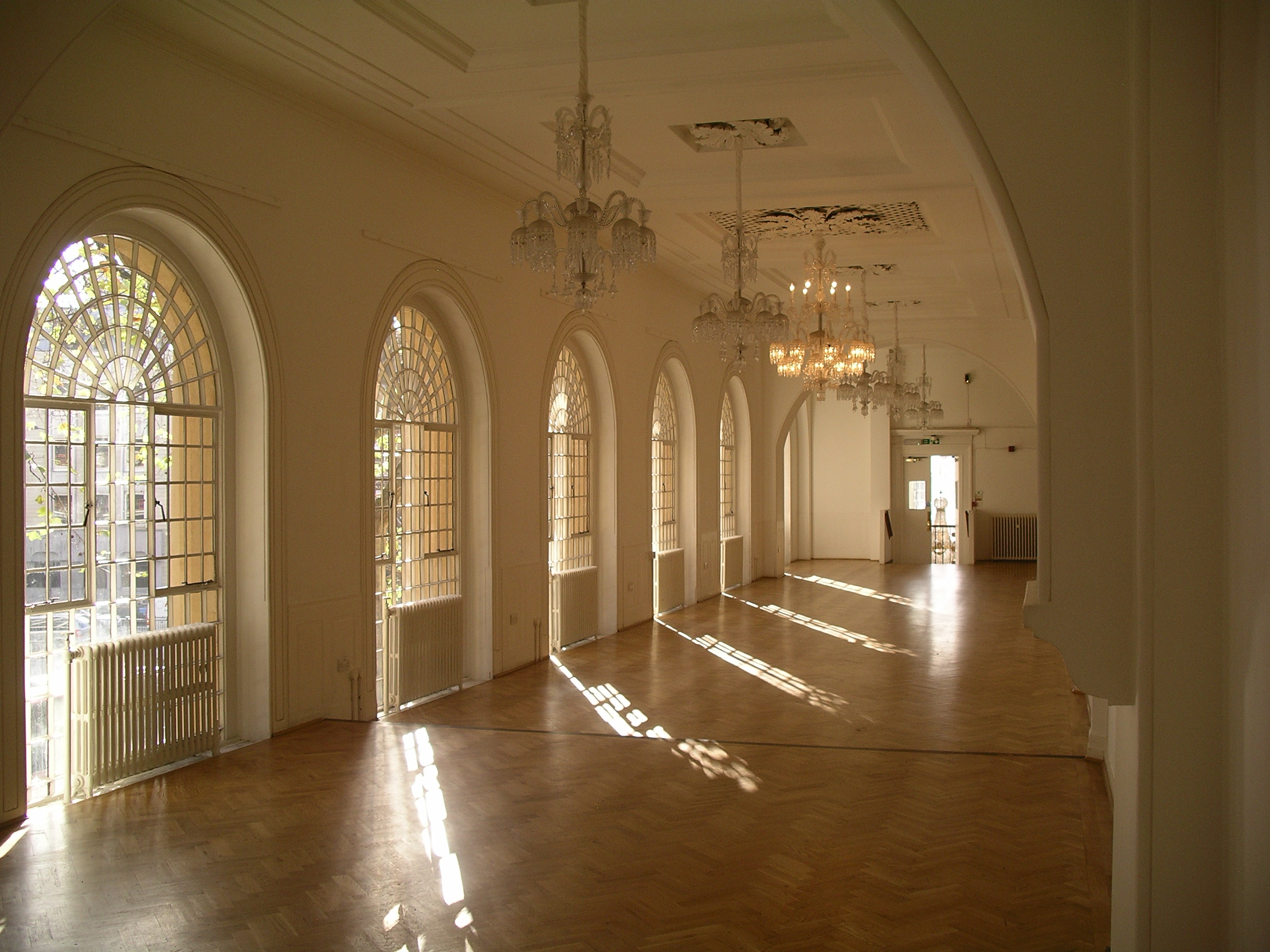 Elegant event space at One Marylebone with arched windows, perfect for gatherings.