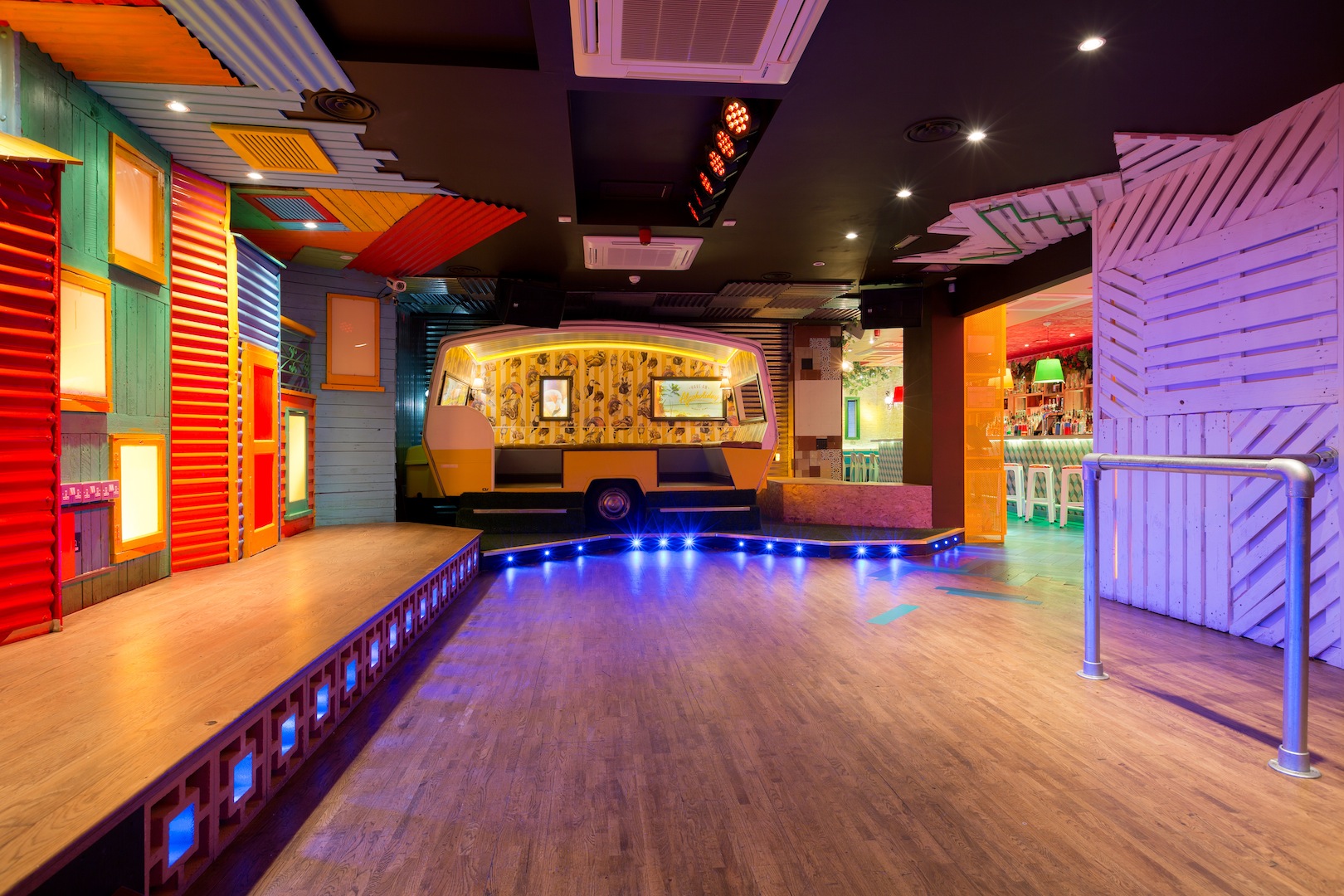 Vibrant event space in Shoreditch with colorful decor for creative gatherings and performances.