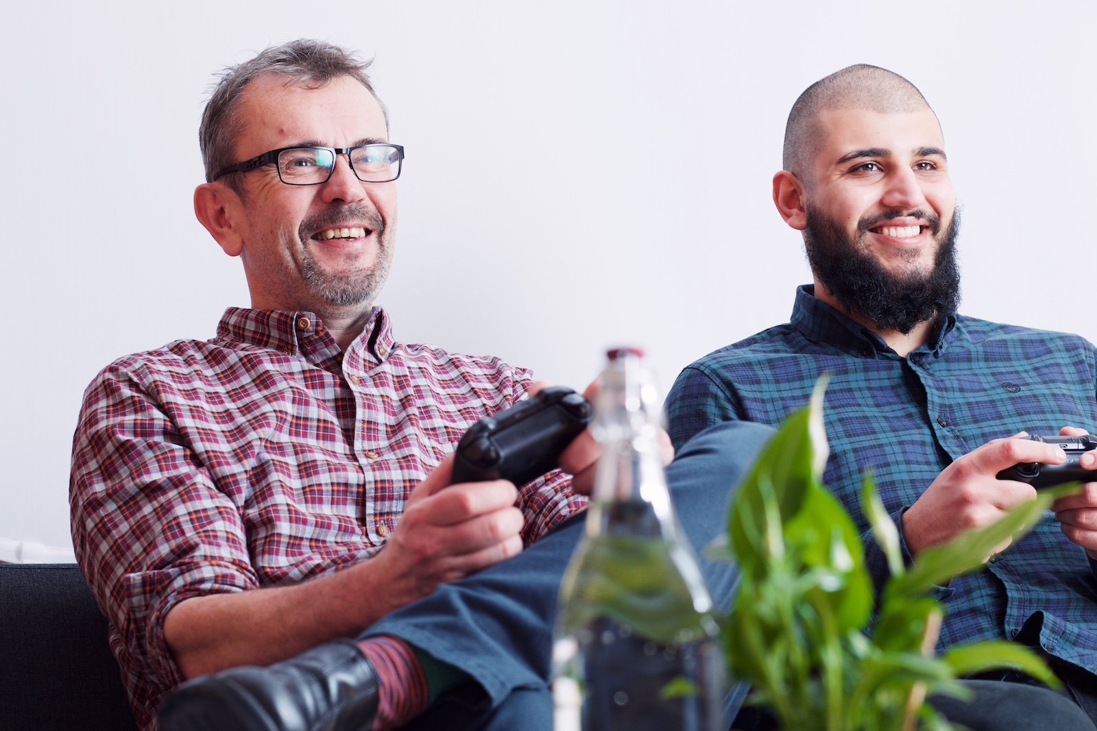 Two people gaming in The Workshop, Sutherland Labs - team-building event, casual setup.