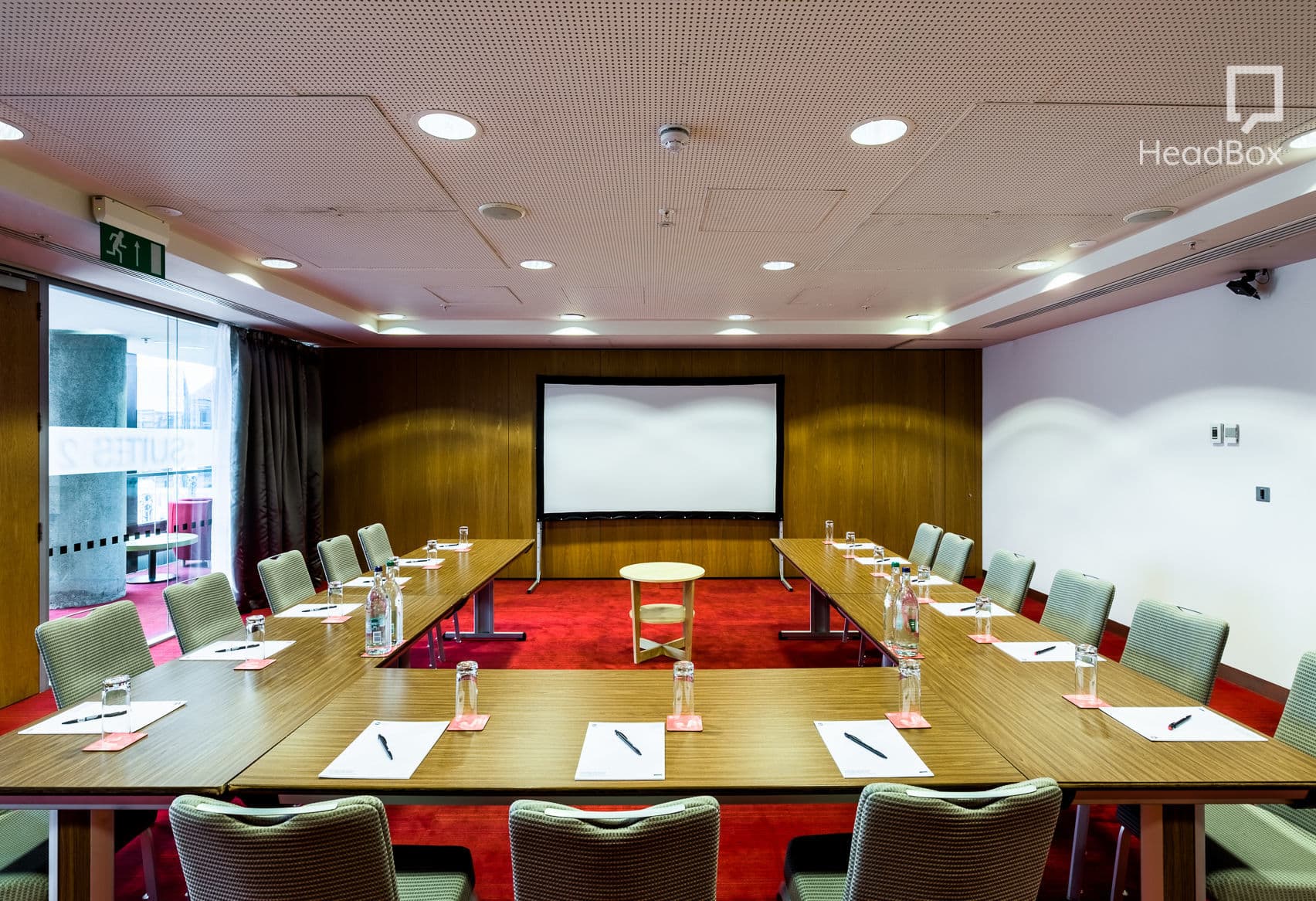 Meeting room with U-shape seating at Unique Venues Birmingham for corporate events.
