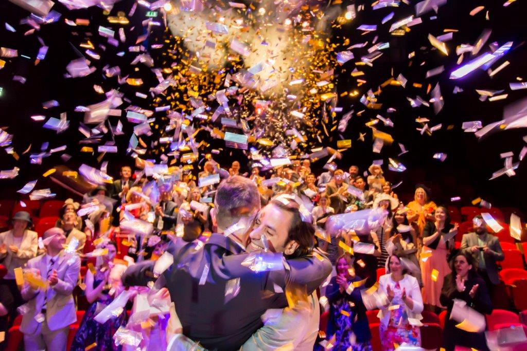 Vibrant celebration with confetti at The Suites, Birmingham event and milestone achievement.