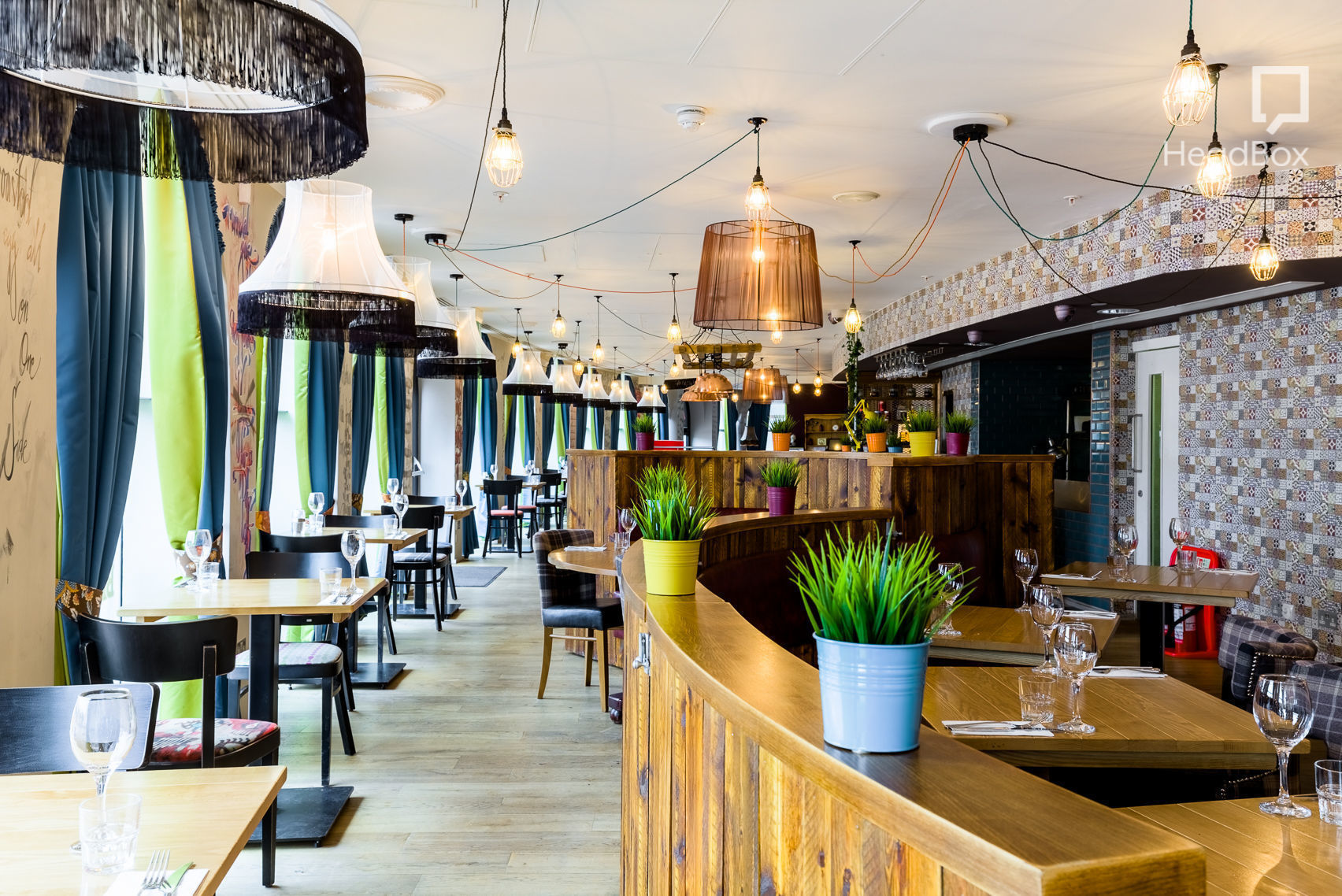 Stylish dining area at The Suites, perfect for meetings and events with cozy decor.