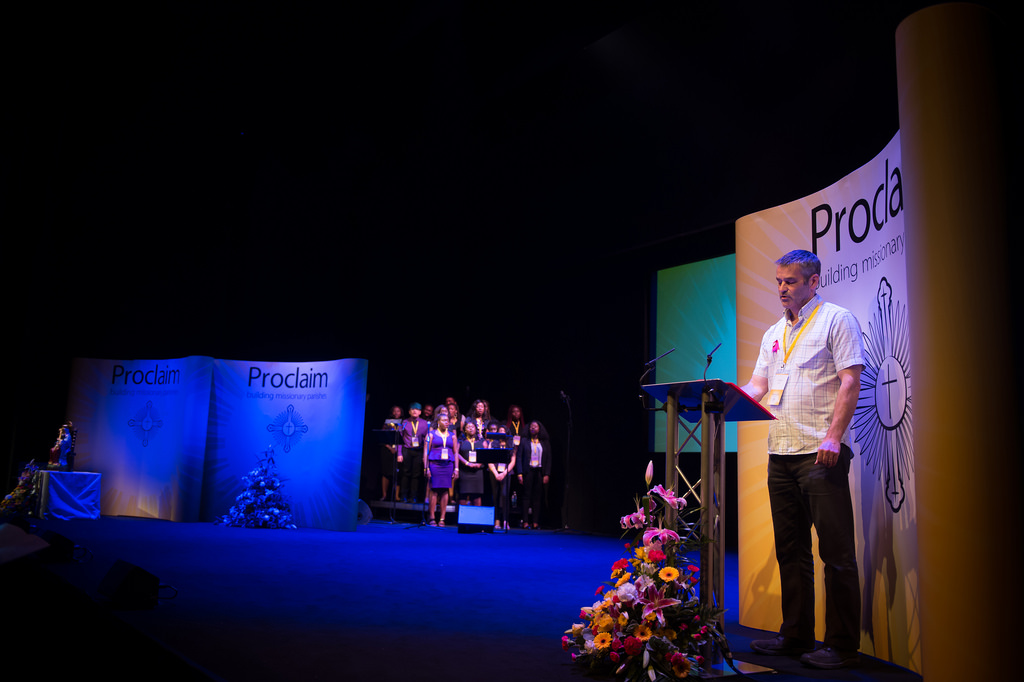 Event setup at The House in Unique Venues Birmingham with speaker and branding backdrop.