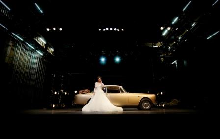 Elegant wedding setup at The House in Unique Venues Birmingham with vintage car and dramatic lighting.