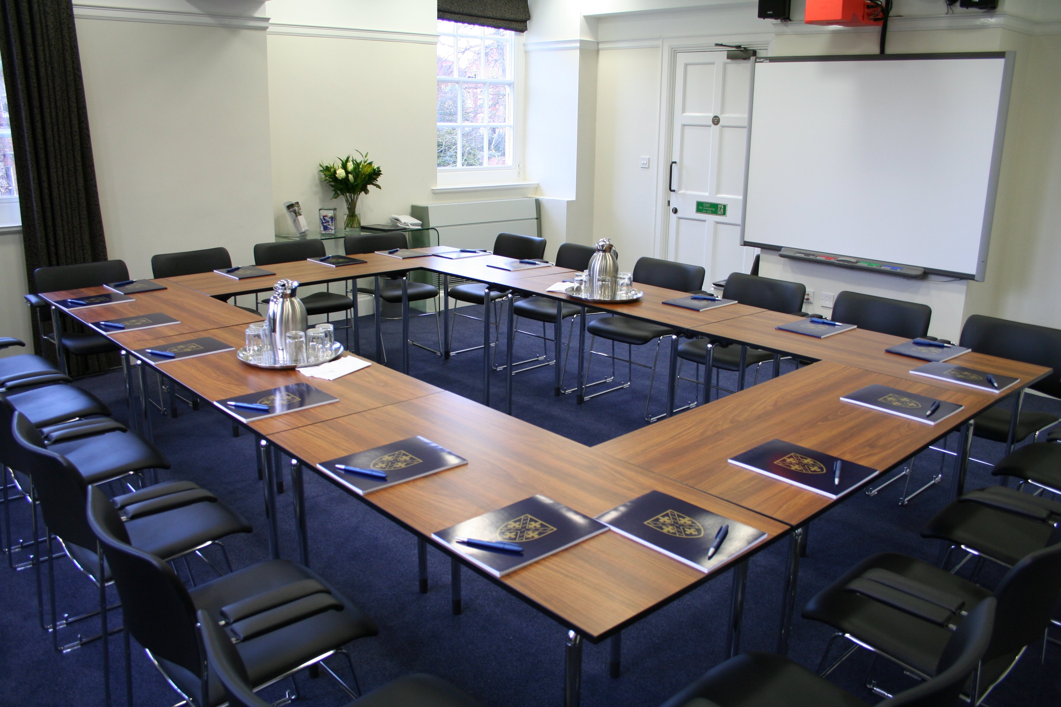 Mordan Seminar Rooms U-shape setup for collaborative meetings at St Hugh's College.
