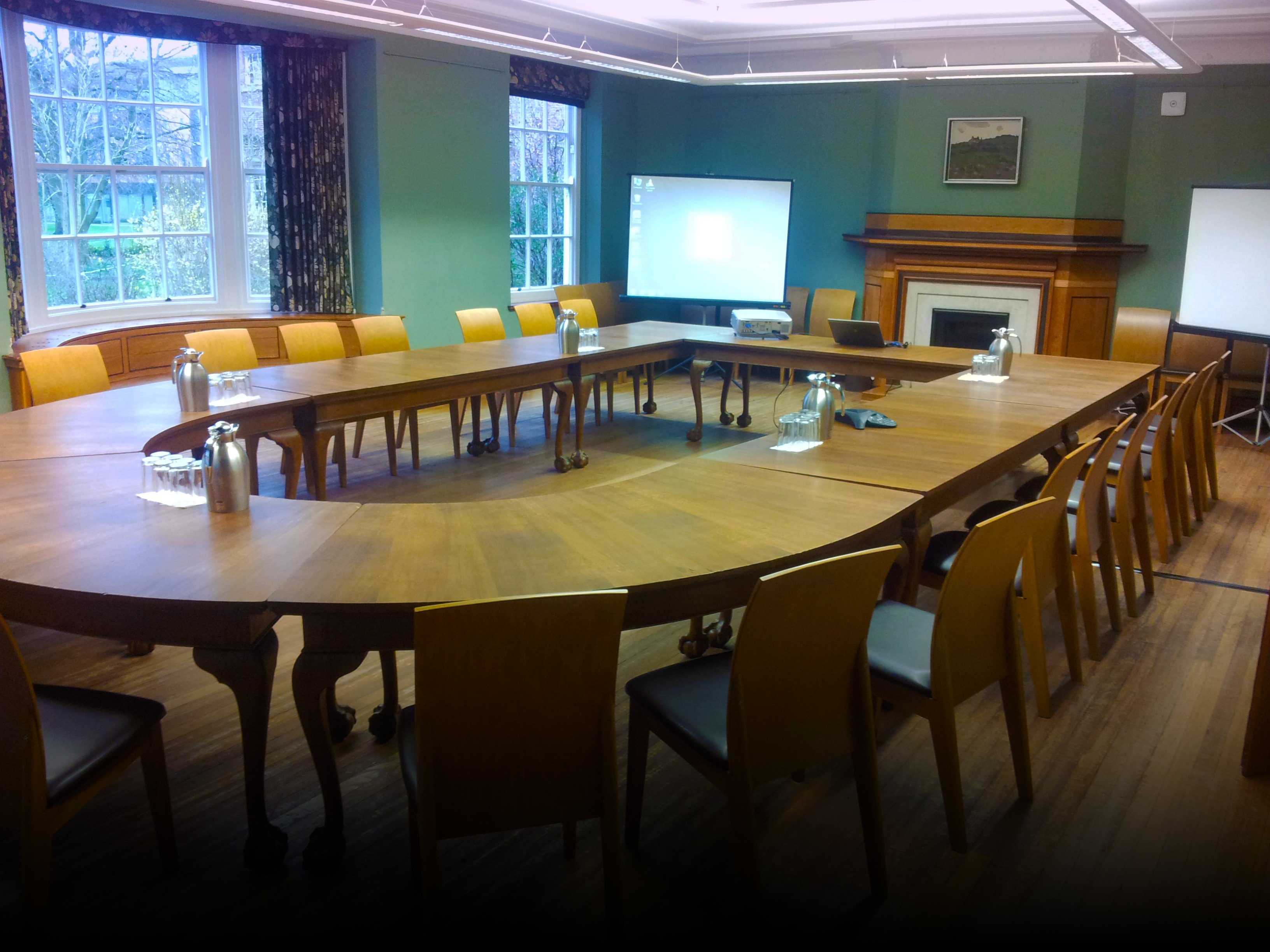 MGA Lecture Room at St Hugh's College, featuring an oval table for workshops and meetings.