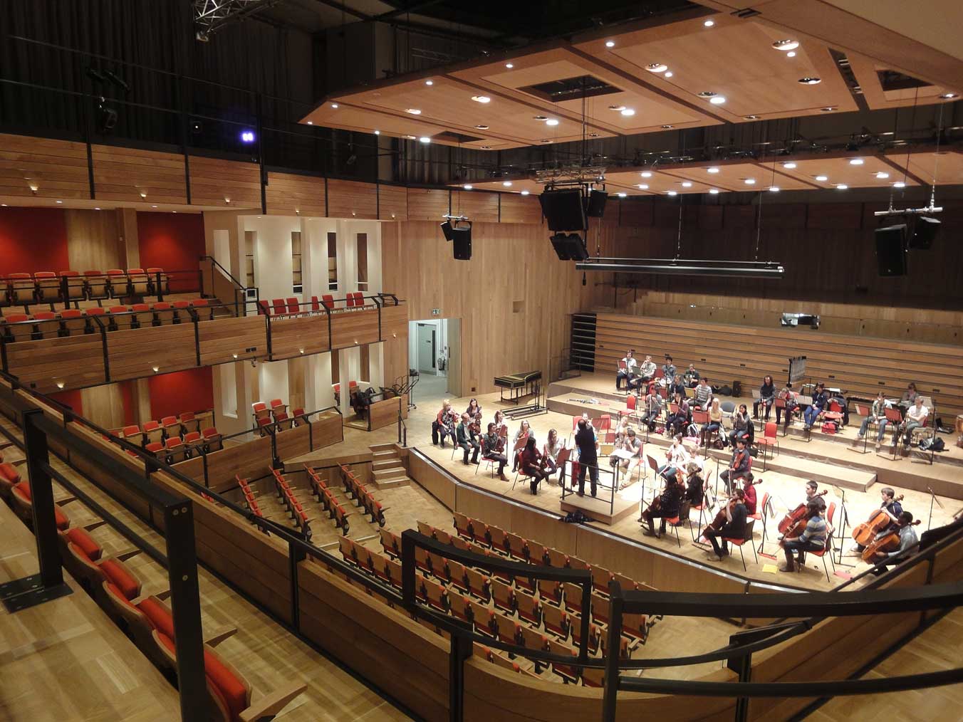Elgar Concert Hall, wooden interiors, ideal venue for orchestral performances and events.