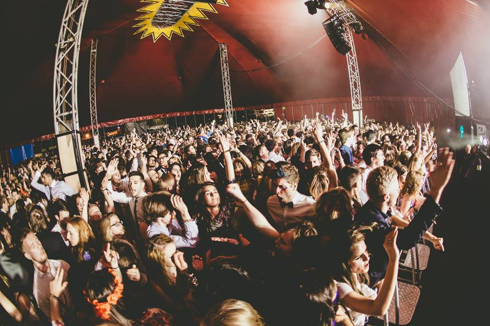 Vibrant crowd at 3sixty, Reading University, enjoying an energetic concert event.