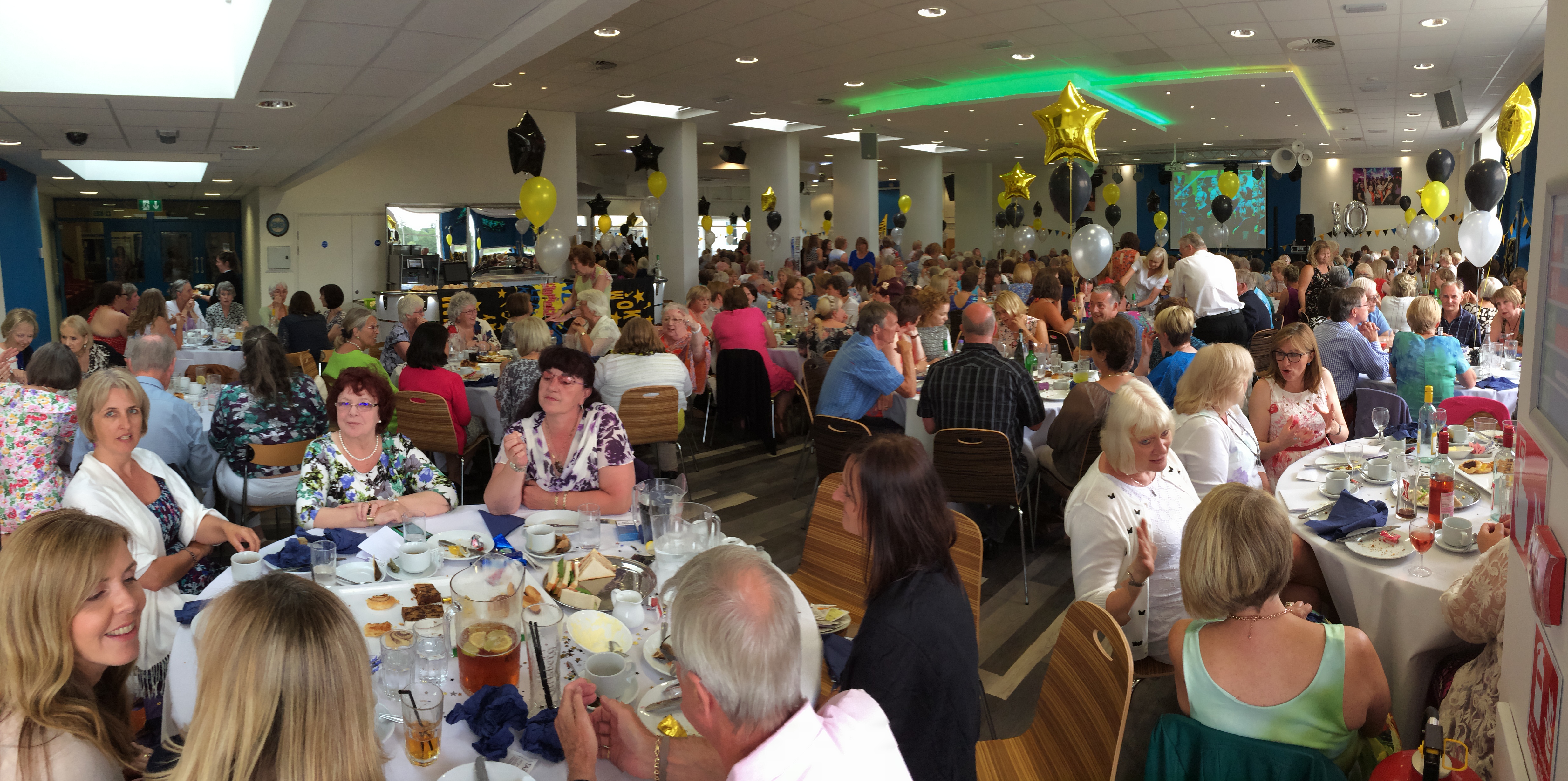 Mojos event space at Reading University, festive dining setup for a lively gathering.