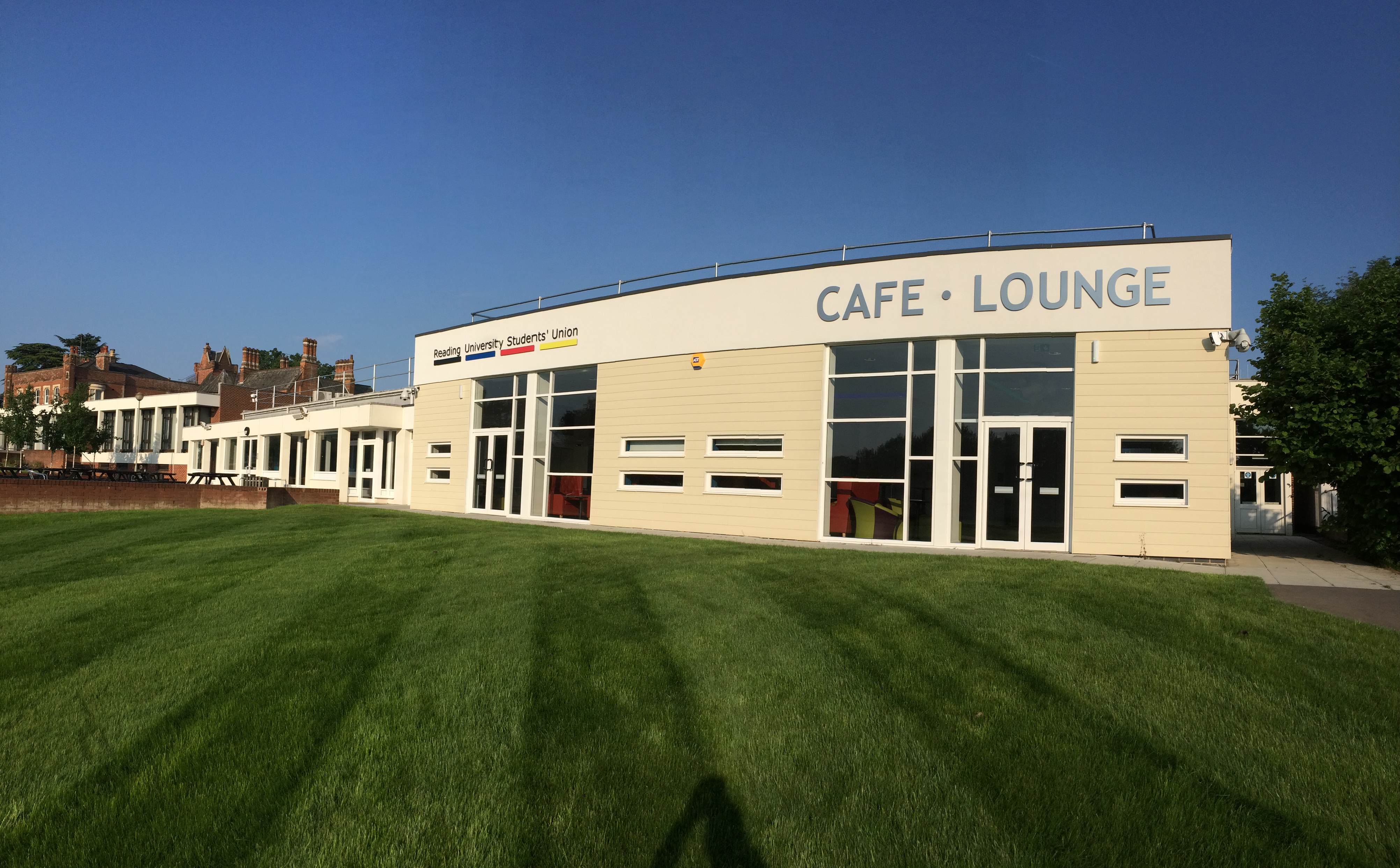 Modern café-lounge at Reading University for networking events with natural light.