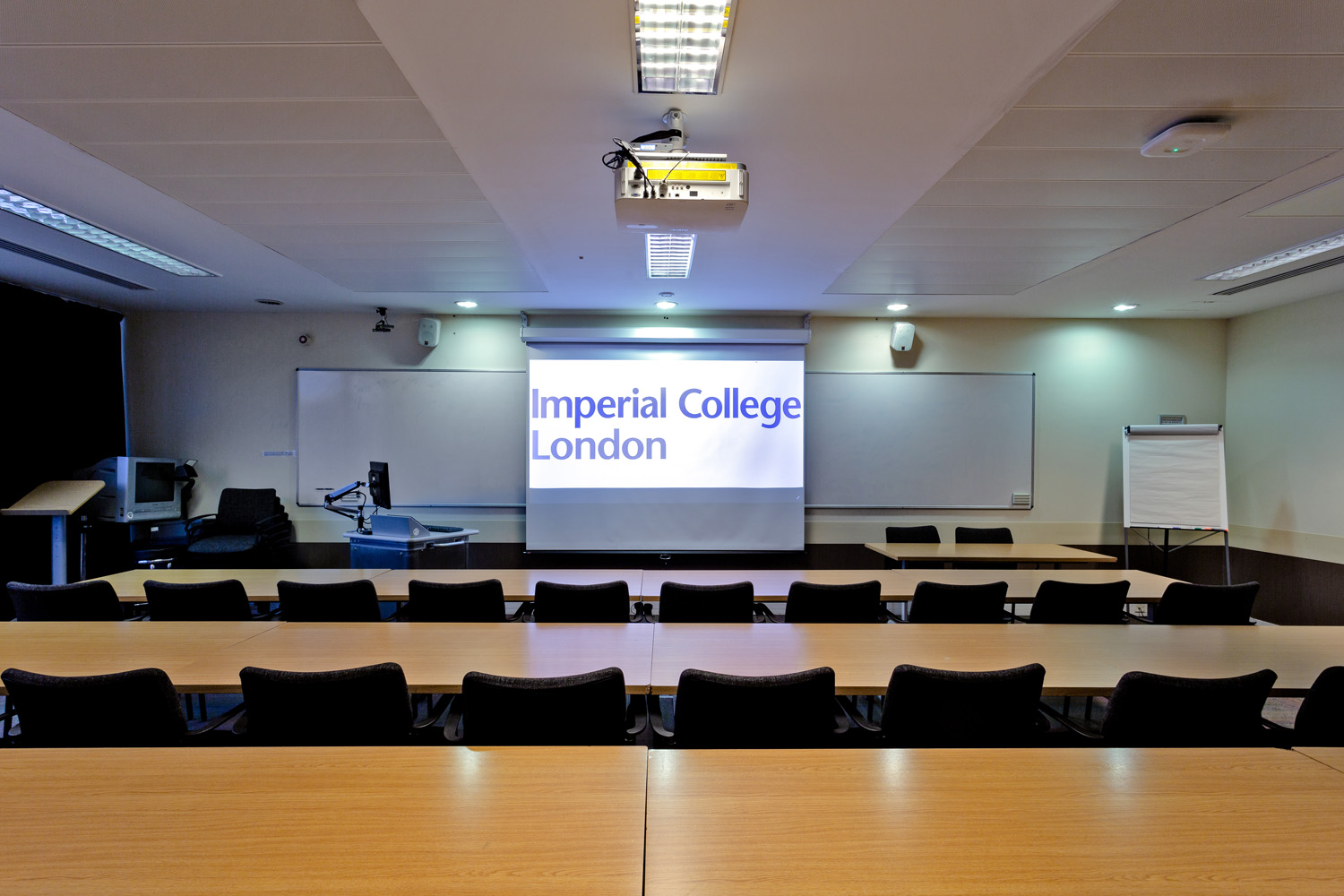 Conference room at Imperial College London with projection screen for seminars and meetings.