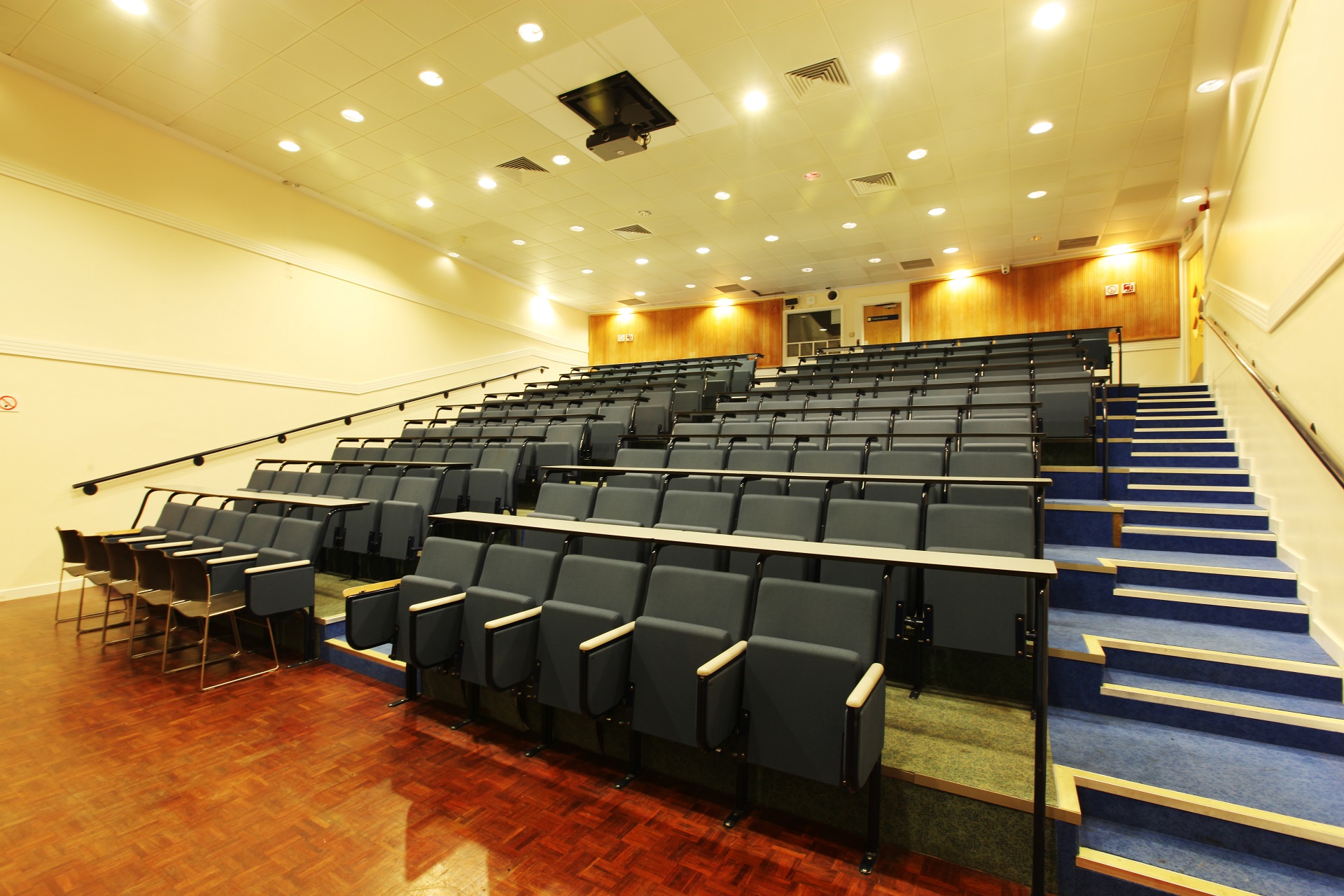 Imperial College auditorium with tiered seating for lectures and presentations.