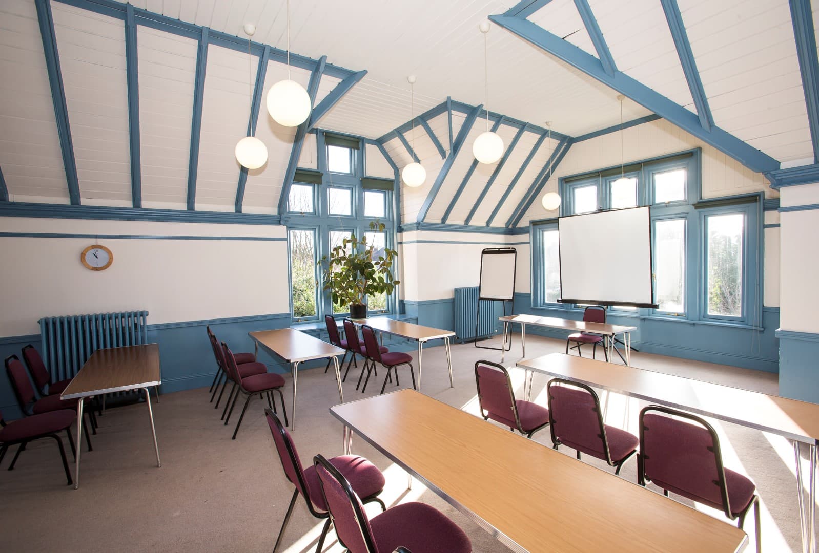 Classroom-style meeting room at Stephens House & Gardens for training workshops and events.