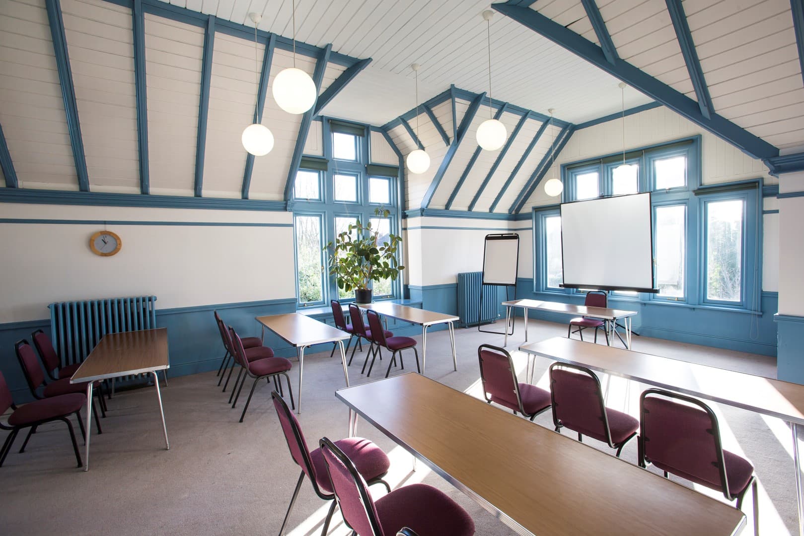 The Stephens Room: A naturally lit meeting space for workshops and breakout sessions.