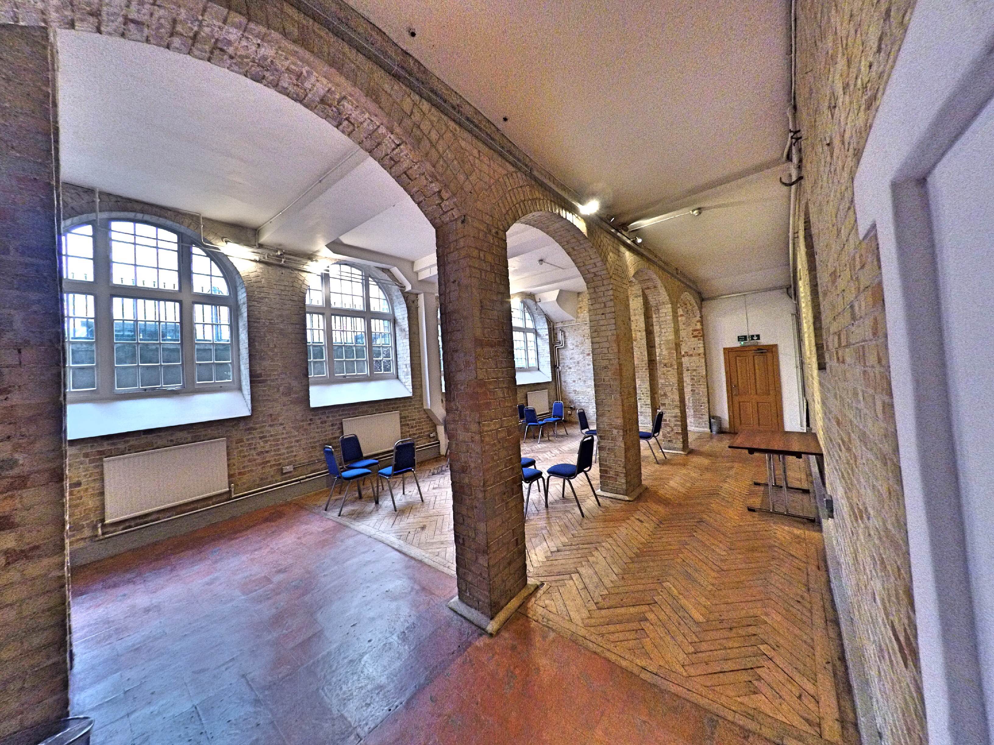 Morris Room at Mary Ward House: spacious event space with high ceilings for workshops.