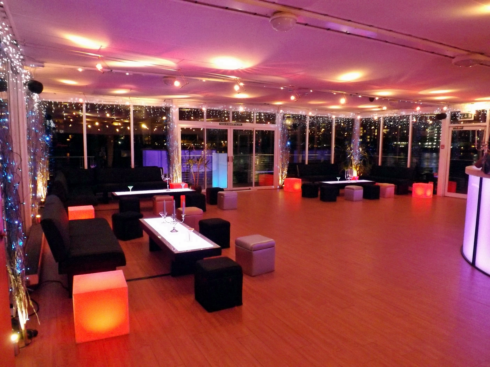 Stylish event space with ambient lighting at Westminster Boating Base for gatherings.