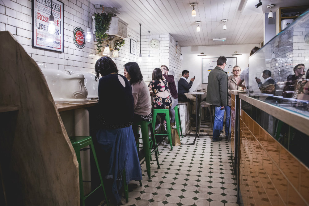 Cozy café venue in Fitzrovia, ideal for networking and informal meetings.