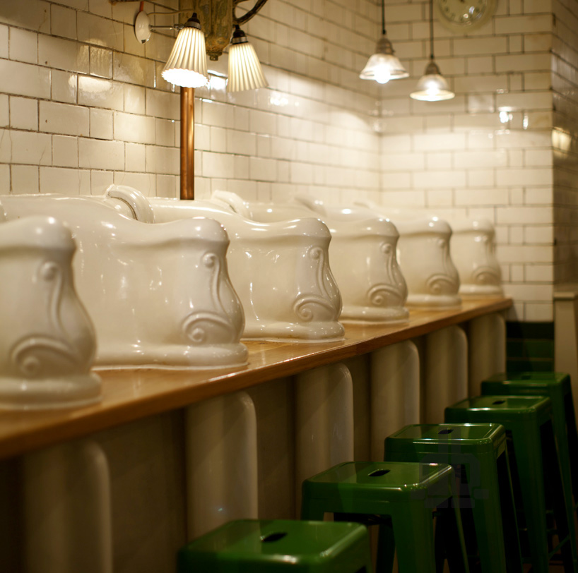 Vintage urinals in elegant restroom at Whole Venue, Attendant Fitzrovia, event venue design.