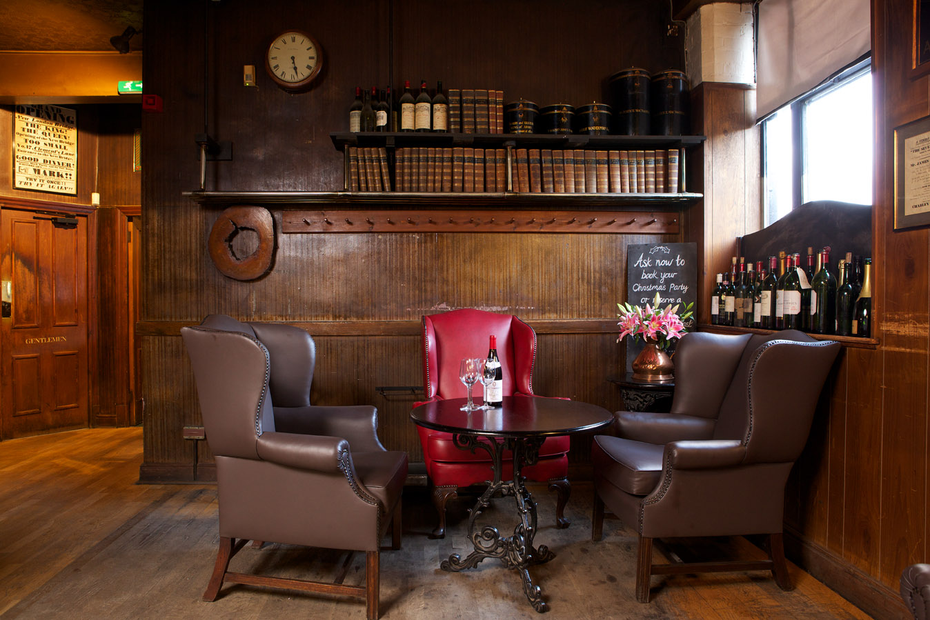 Cozy meeting space at Boot and Flogger with warm lighting for networking events.