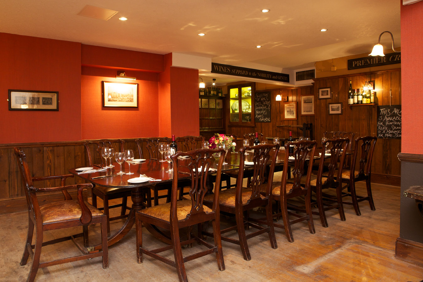 Red room at Boot and Flogger, elegant dining space for corporate dinners and private events.