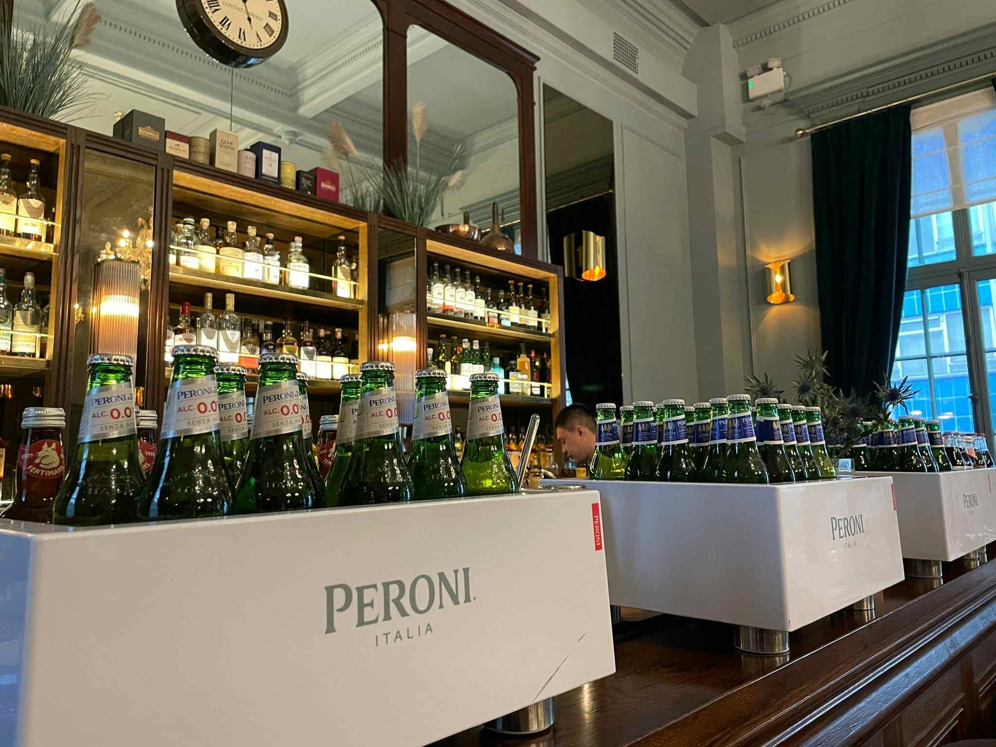 Beverage station at Spey Bar, Covent Garden, featuring Peroni beers for networking events.