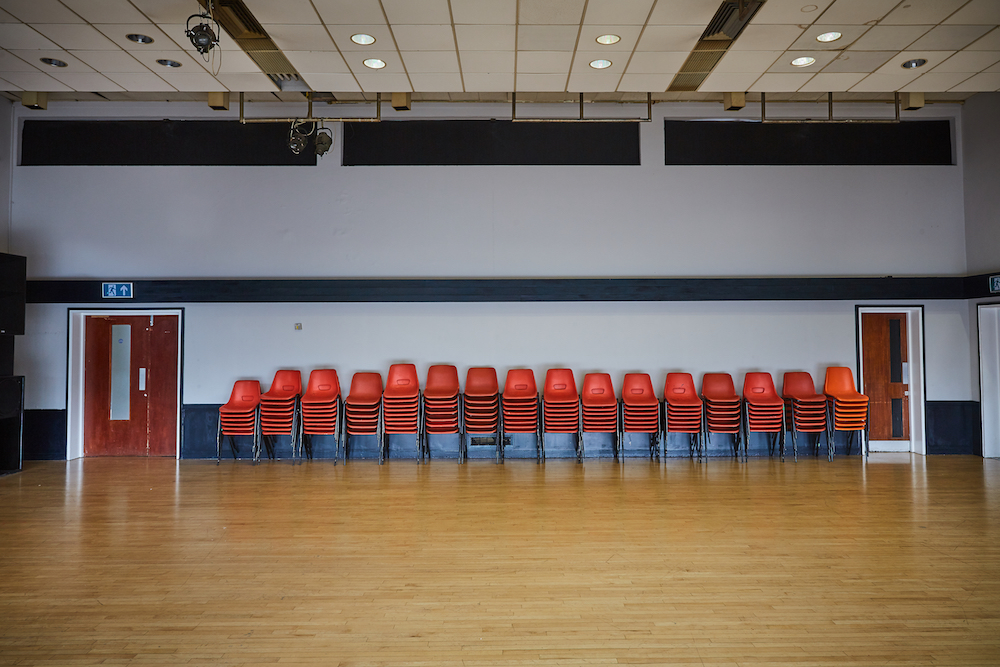 Spacious Mill Co. Rose Lipman Main Hall with polished floor for events and gatherings.