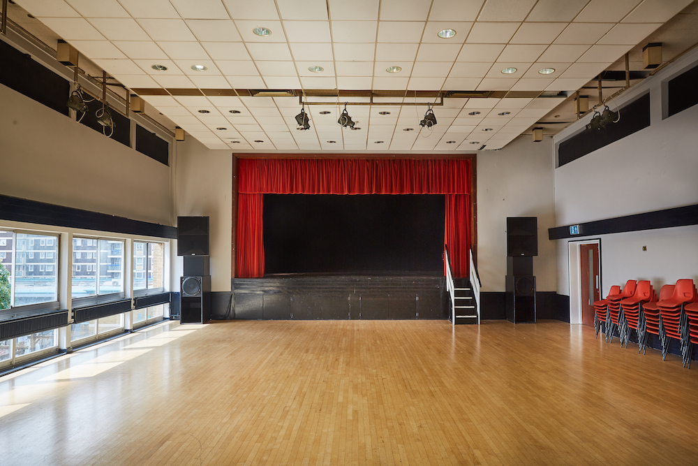 Main Hall at Mill Co. Rose Lipman, spacious wooden floor, ideal for events and gatherings.