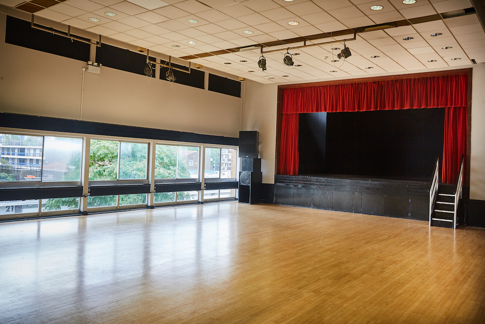 Main Hall at Mill Co. Rose Lipman, spacious wooden floor, ideal for events and performances.