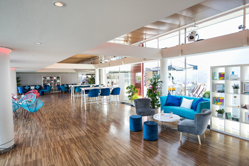 Weston Roof Pavilion: modern event space with vibrant decor for networking and gatherings.