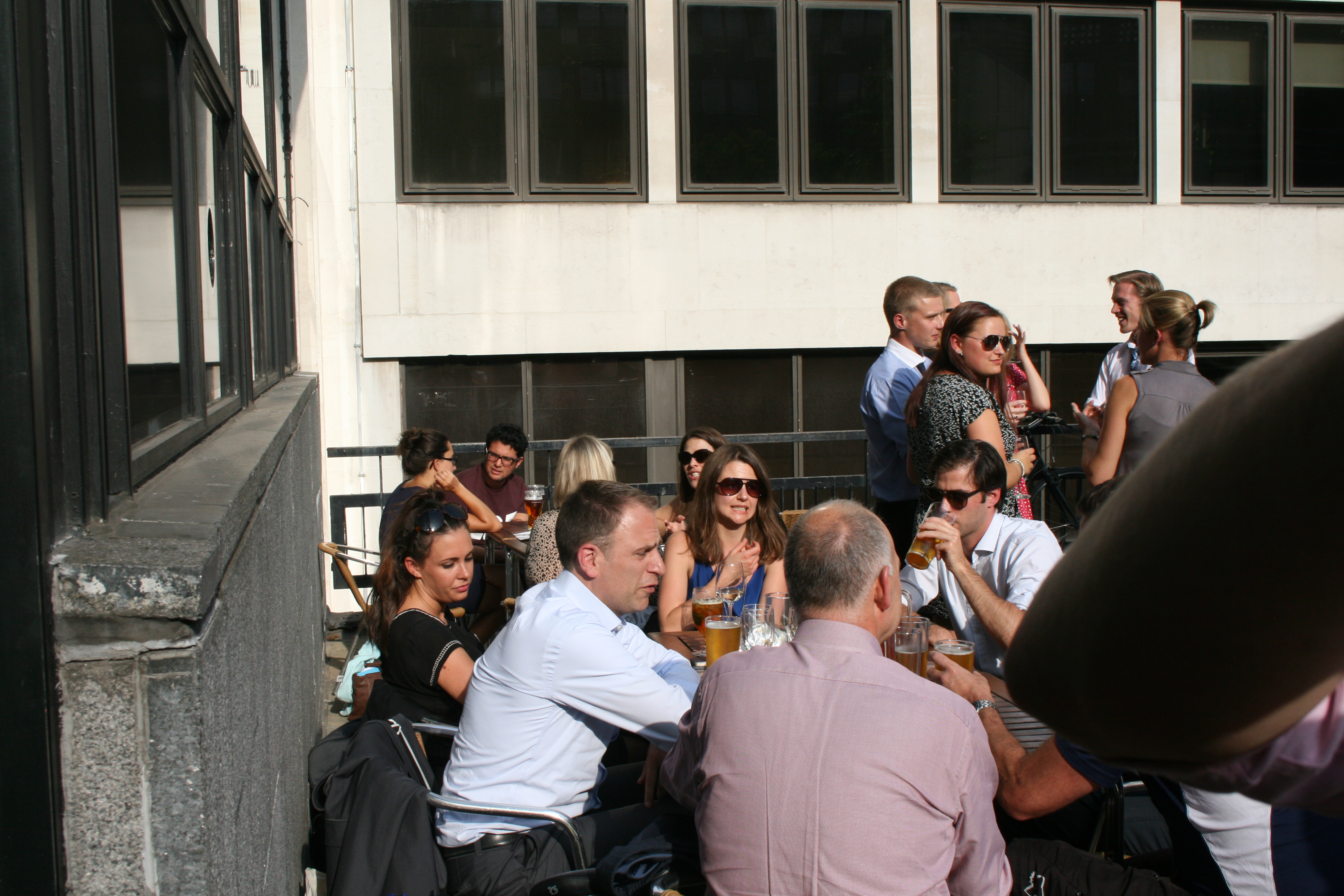 Vibrant outdoor networking event in Back Garden, Wine Tun, fostering connections and ideas.