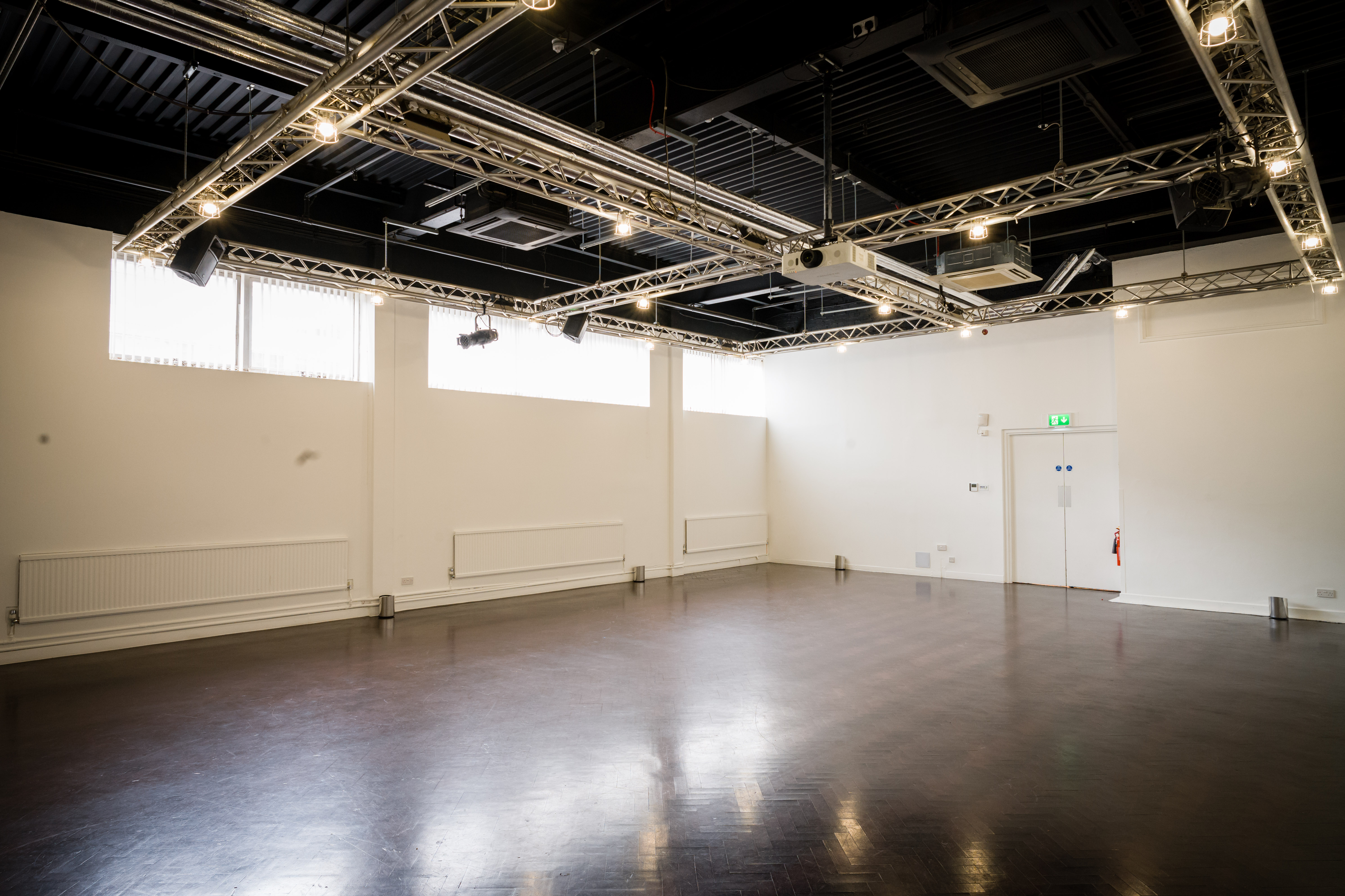 "Queenhithe event space in The Mermaid London, bright minimalist design for meetings and workshops."