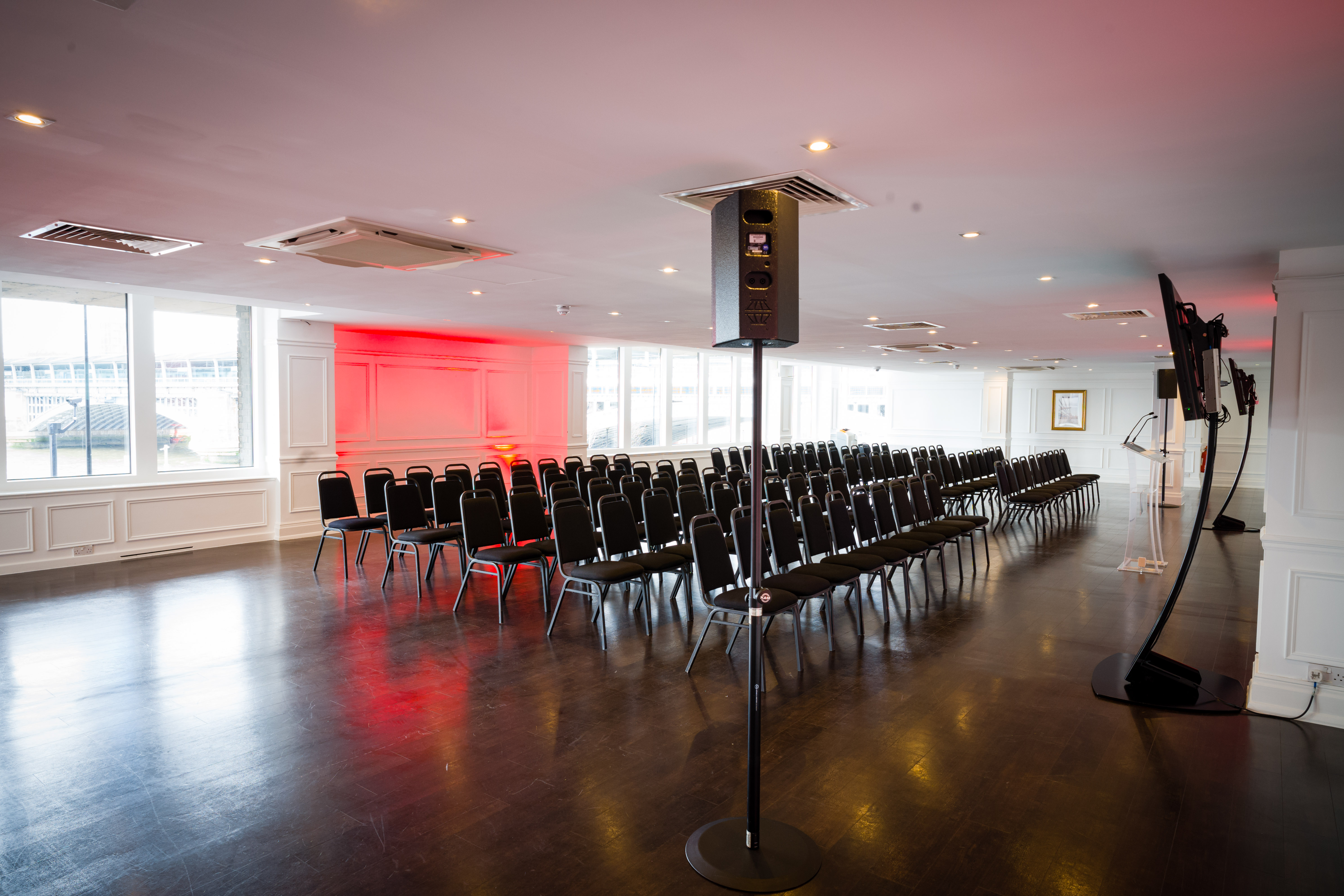 Lower River Room at The Mermaid London, modern event space for corporate meetings.