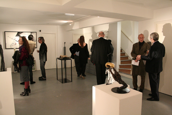 Sophisticated art gallery for networking events with elegant sculptures and artwork.
