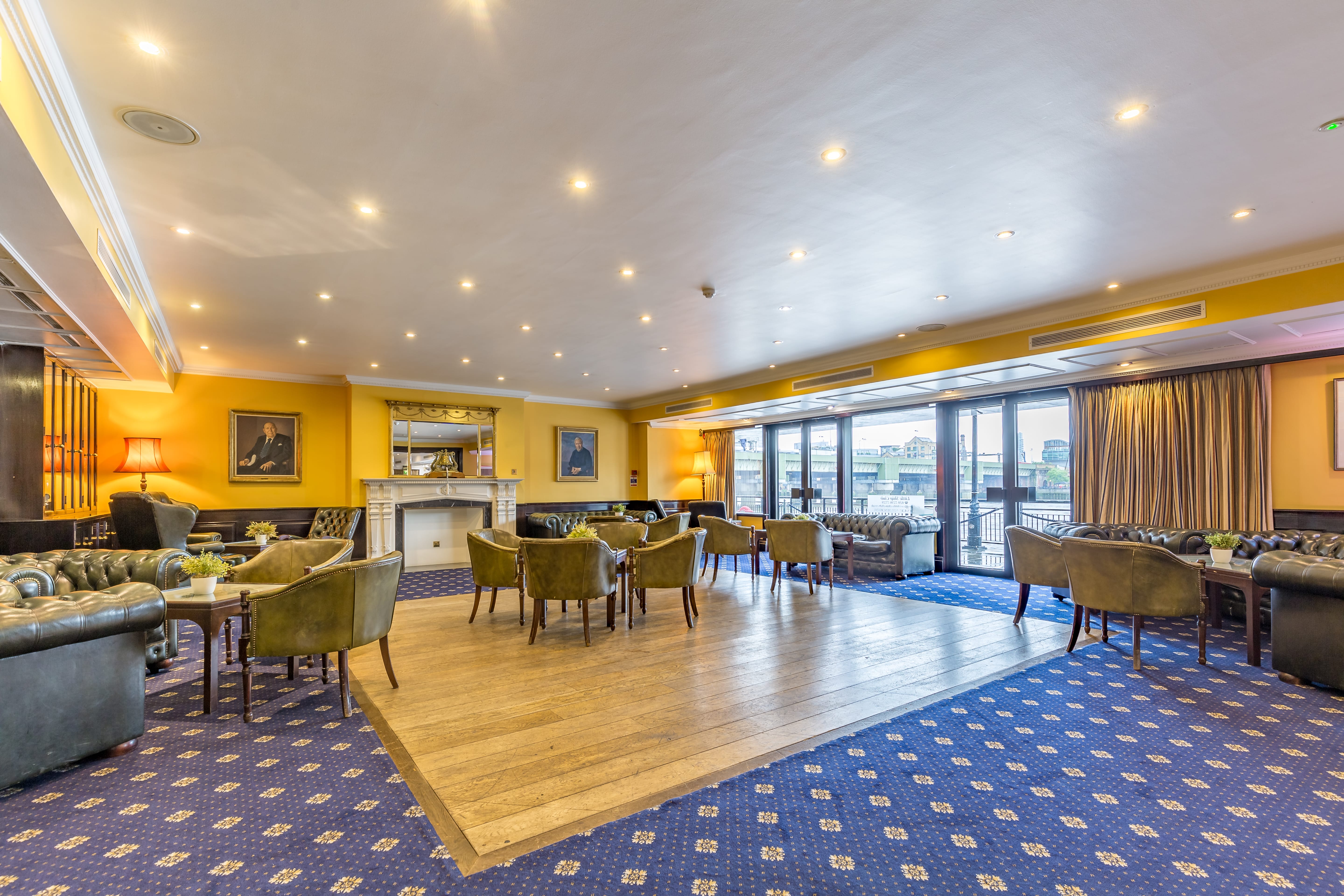 Club Room at Little Ship Club, featuring warm lighting for networking events.