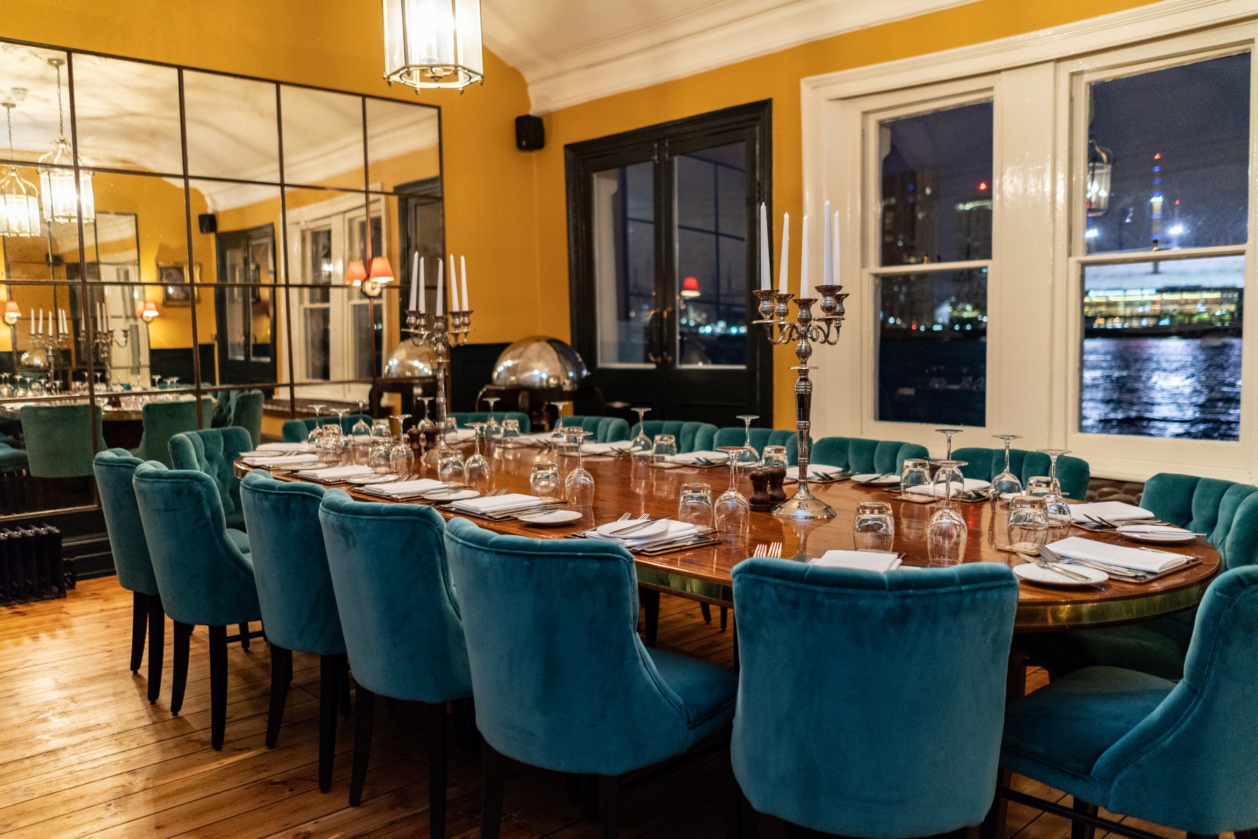 Elegant dining setup in The River Room, ideal for upscale events and corporate dinners.