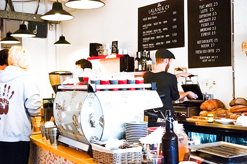 Vibrant café for informal meetings with quality refreshments and social hub ambiance.